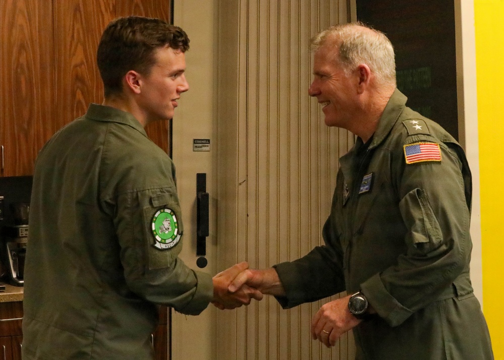 Rear Adm. Rich Brophy recognizes enlisted Sailor assigned HSC-7