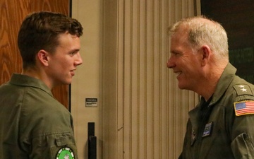 Rear Adm. Rich Brophy recognizes enlisted Sailor assigned HSC-7