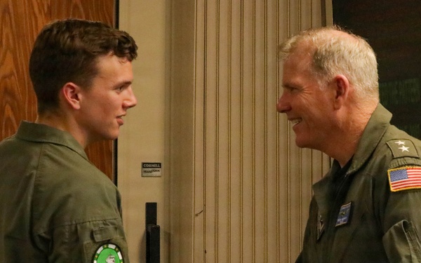 Rear Adm. Rich Brophy recognizes enlisted Sailor assigned HSC-7