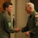 Rear Adm. Rich Brophy recognizes enlisted Sailor assigned HSC-7