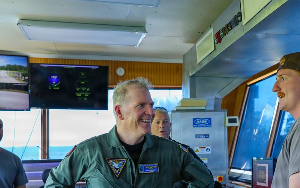 Rear Adm. Rich Brophy receives a tour of the Navy Dare Range