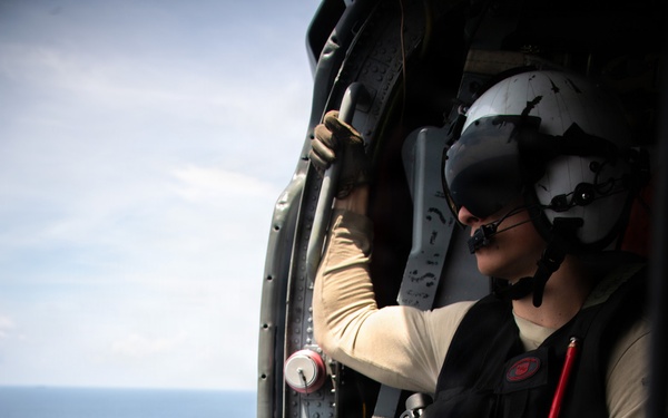 Boxer Sailor Reenlists Aboard MH-60S Sea Hawk