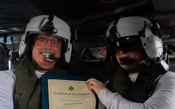 Boxer Sailor Reenlists Aboard MH-60S Sea Hawk