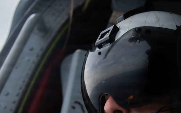 Boxer Sailor Reenlists Aboard MH-60S Sea Hawk
