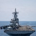 Boxer Sailor Reenlists Aboard MH-60S Sea Hawk