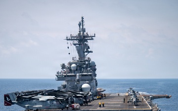 Boxer Sailor Reenlists Aboard MH-60S Sea Hawk
