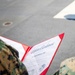 U.S. Marine with the 26th MEU reenlists on the USS Kearsarge