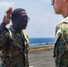U.S. Marine with the 26th MEU reenlists on the USS Kearsarge