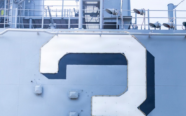 U.S. Marine with the 26th MEU reenlists on the USS Kearsarge