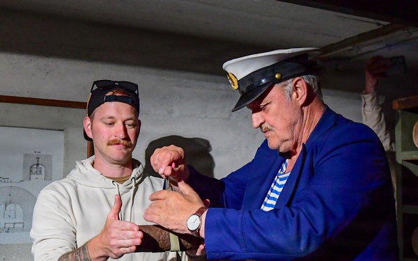 U.S. Navy Sailors participate in a historical tour in Liepaja during BALTOPS 2026