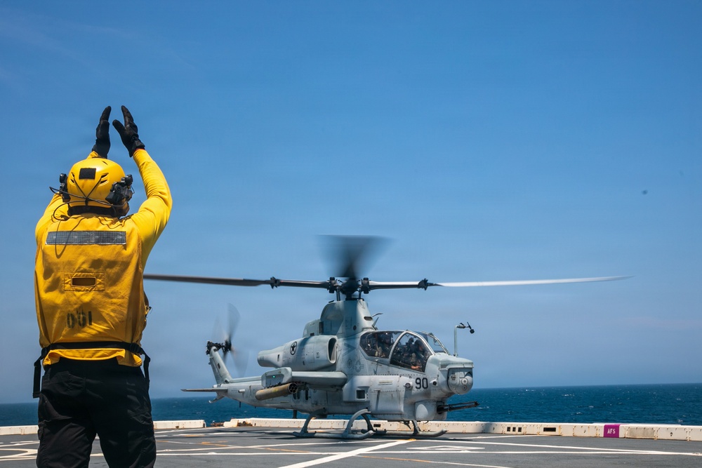 USS Arlington (LPD 24) conduct flight operations with HMLA 167