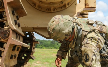 Army Reserve engineers deploy a bulldozer to dig defensive battle positions during Operation Sentinel Justice