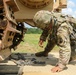 Army Reserve engineers deploy a bulldozer to dig defensive battle positions during Operation Sentinel Justice