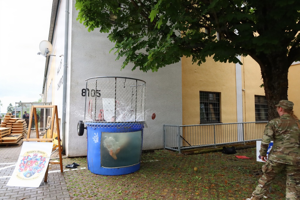 Commander Takes Dunk Tank Drop During Army Birthday Festivities