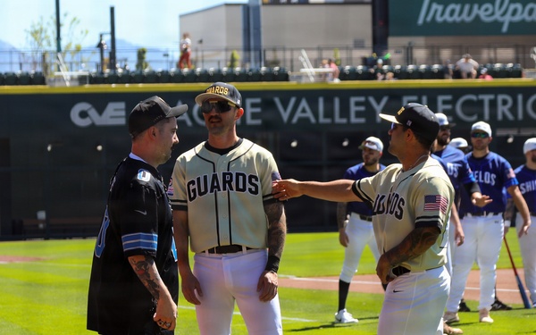 Utah Guardians Baseball Players Meet with Civilian Fan on Field Before Game