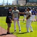 Utah Guardians Baseball Players Meet with Civilian Fan on Field Before Game