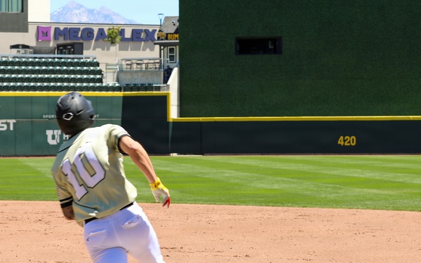 Baseball player No. 10 rounds third base at Smith's Ballpark in Salt Lake City