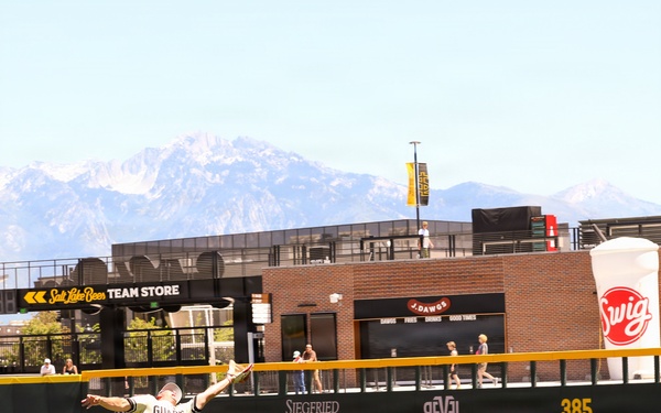 Salt Lake Bees outfielder makes leaping catch at Smith's Ballpark with Wasatch Mountains backdrop