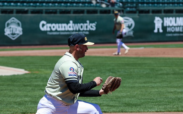 First Baseman Stretches for Throw During Minor League Baseball Game