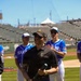 Military-Connected Individual Participates in Baseball Ceremonial Event at Professional Stadium