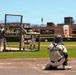 Baseball catcher receives pitch during batting practice at outdoor stadium