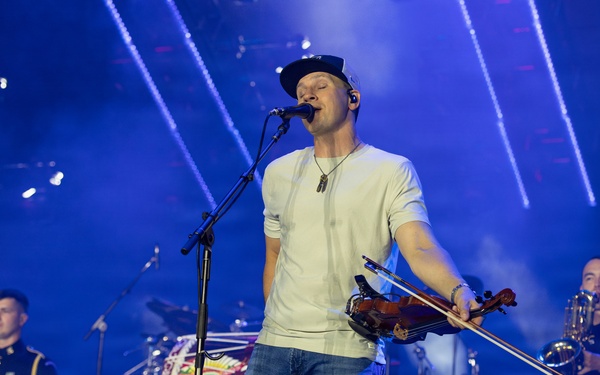 The U.S. Army Ceremonial Band performs with Zac Brown Band at Freedom 250 Fan Fest