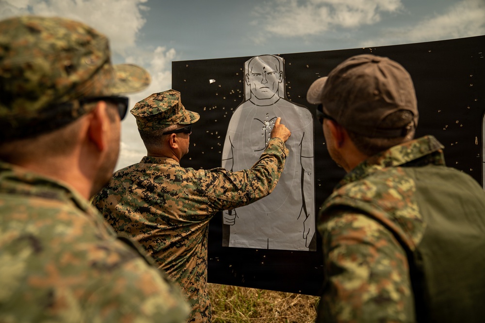 U.S. Marines conduct an M18 pistol range in Romania during Sea Breeze 26