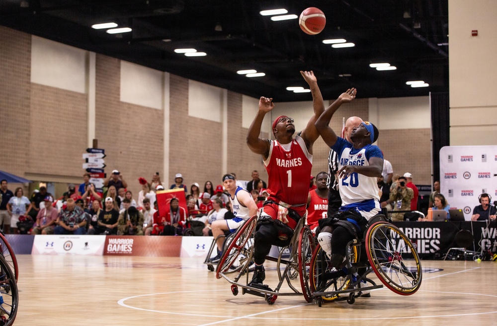 Team Marine Corps Pushes Forward in Wheelchair Basketball Competition