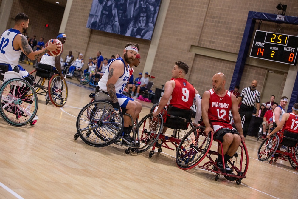 Team Marine Corps Pushes Forward in Wheelchair Basketball Competition