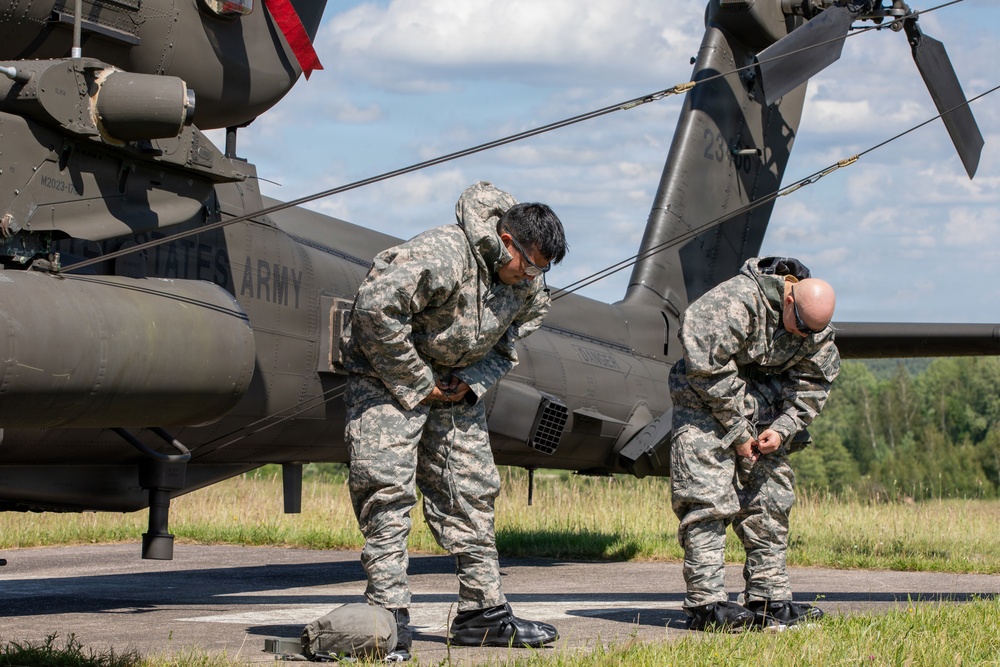 Gunslinger: 12 Combat Aviation Brigade Decontaminates AH-64 Apache