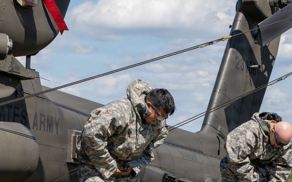 Gunslinger: 12 Combat Aviation Brigade Decontaminates AH-64 Apache