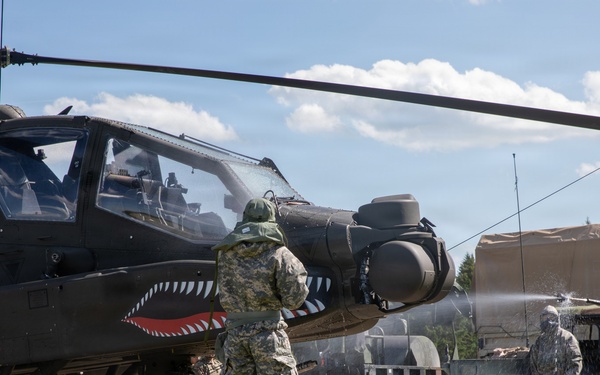 Gunslinger: 12 Combat Aviation Brigade Decontaminates AH-64 Apache