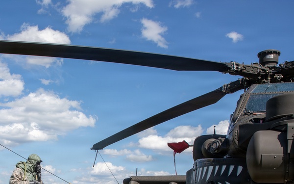 Gunslinger: 12 Combat Aviation Brigade Decontaminates AH-64 Apache