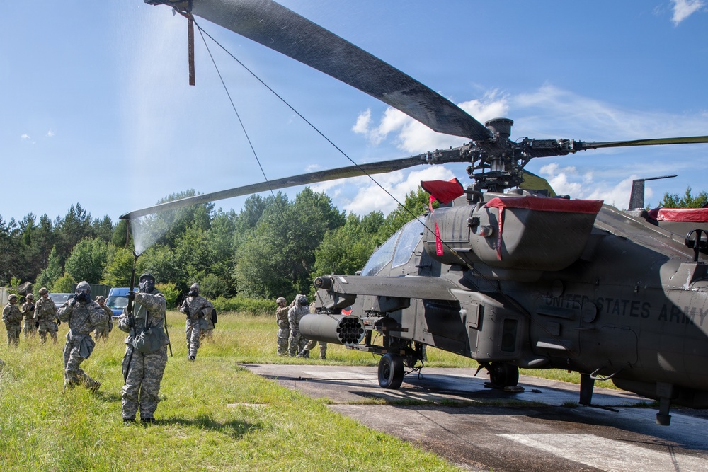 Gunslinger: 12 Combat Aviation Brigade Decontaminates AH-64 Apache