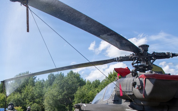 Gunslinger: 12 Combat Aviation Brigade Decontaminates AH-64 Apache