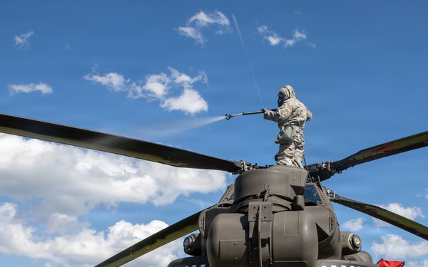 Gunslinger: 12 Combat Aviation Brigade Decontaminates AH-64 Apache