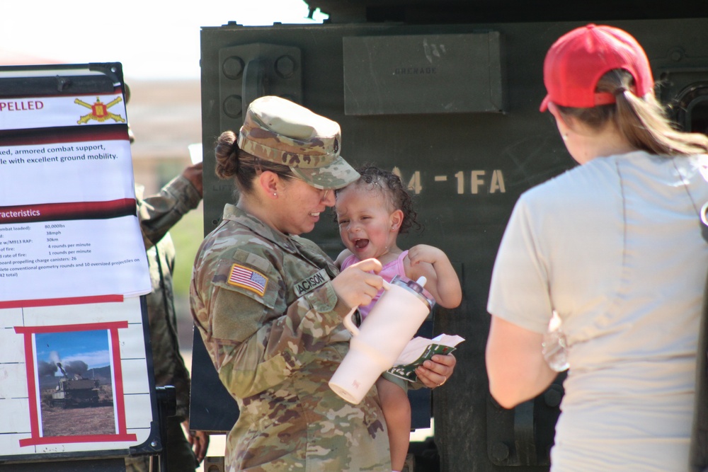 Sharing the mission: SFC Jackson shares the Paladin with her daughter
