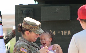 Sharing the mission: SFC Jackson shares the Paladin with her daughter