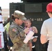 Sharing the mission: SFC Jackson shares the Paladin with her daughter