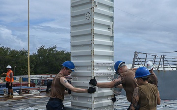 Frank E. Petersen Jr. Sailors Conduct an Ammunition On Load