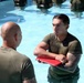 U.S. Marine Corps Sgt. Jorge D. Bosquez and Cpl. Angel F. Cazares reenlist