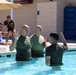 U.S. Marine Corps Sgt. Jorge D. Bosquez and Cpl. Angel F. Cazares reenlist