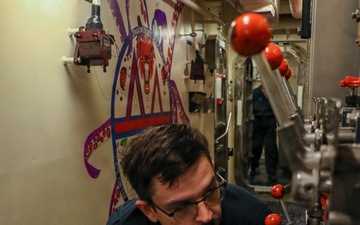 Frank E. Petersen Jr. Sailor Conducts Maintenance