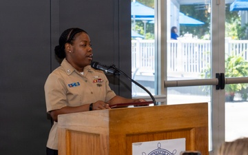 Air Traffic Controller 1st Class Shakila Duff receives the 2026 Margaret Flowers Outstanding Military Volunteer Award