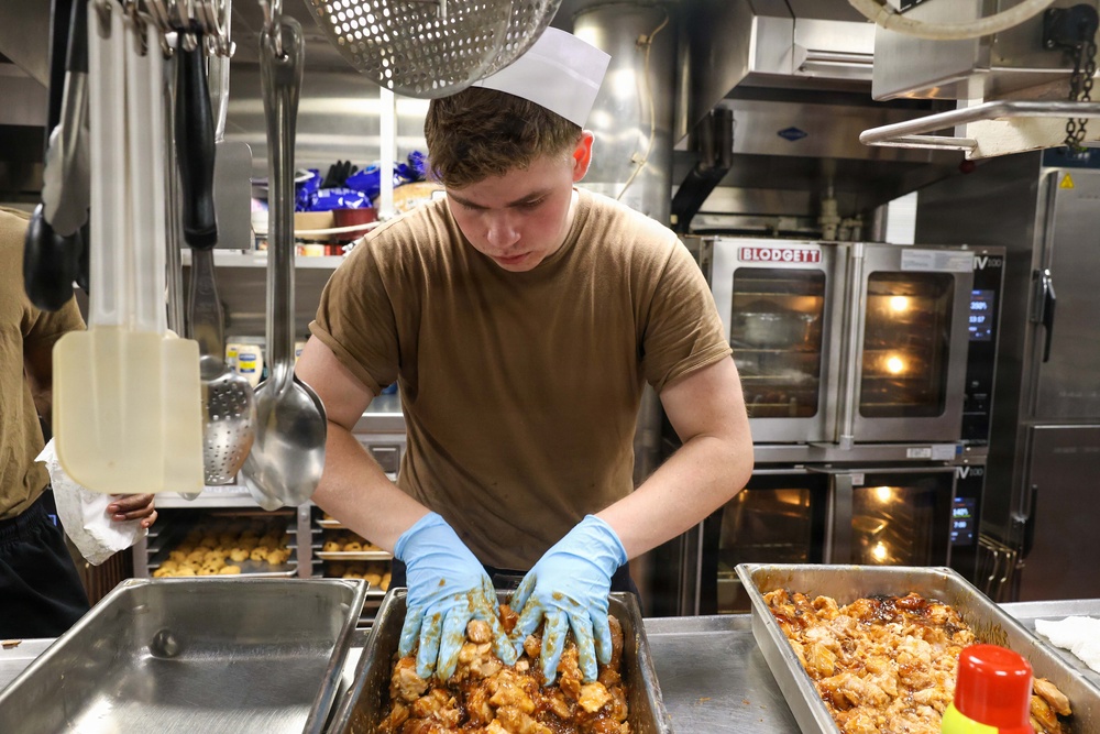 John Finn prepares a meal