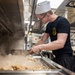 USS Donald Cook (DDG 75) prepares chicken for the crew