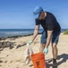 Sailors, Airmen Take Part in Sand Island State Recreation Area Cleanup