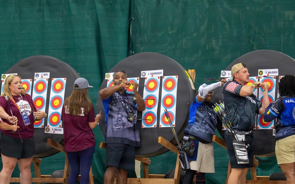 Competitors Recover Arrows Archery Event.