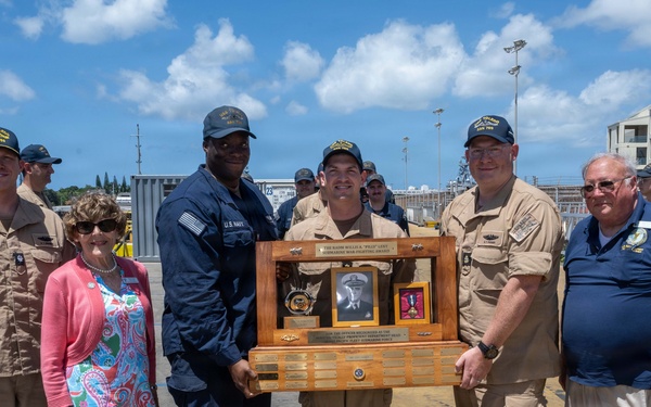 USS Toledo (SSN 769) Sailor receives the    Rear Adm. Willis A. “Pilly” Lent Tactics and Warfighting Award