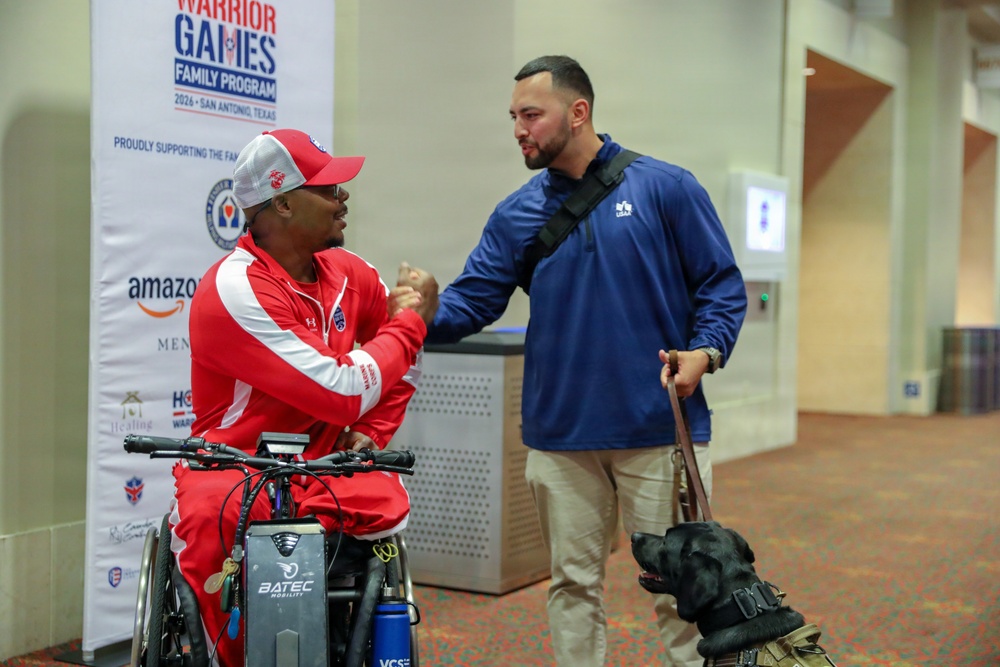 USAA therapy dog interacting at 2026 Warrior Games